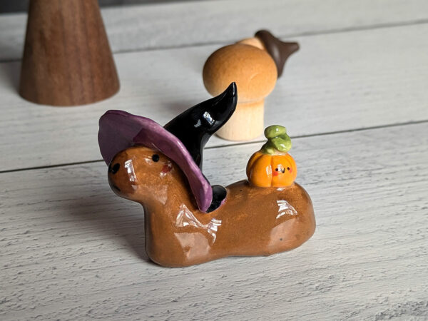 figurine capybara witch