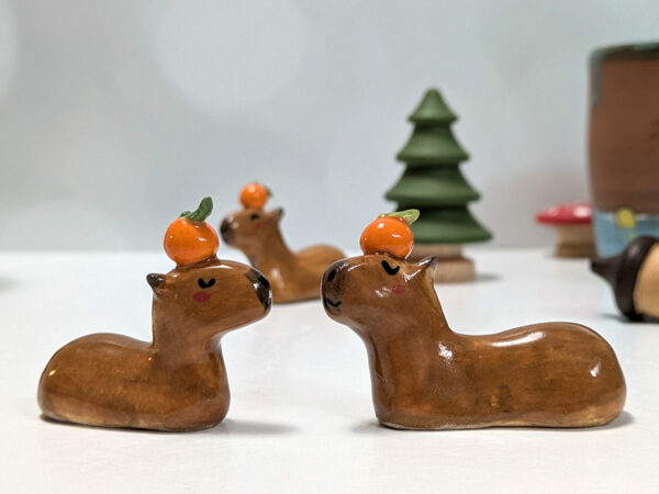 ceramic figurine capybara orange holder