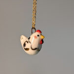 white hen porcelain pendant with gold