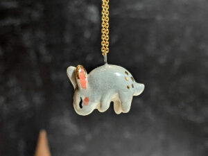 cute bunny porcelain pendant in gold and white