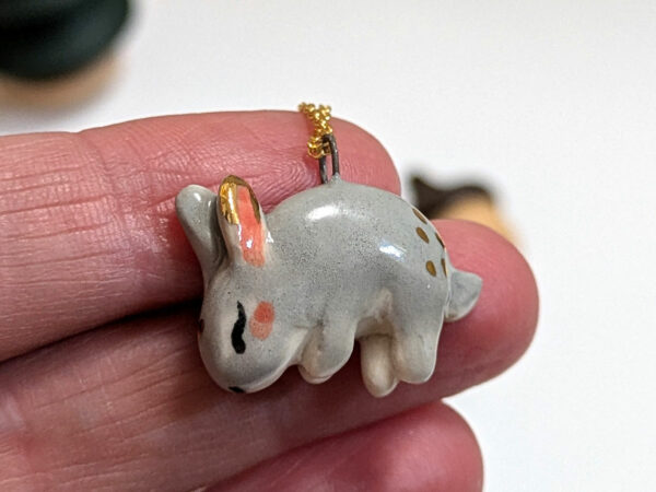 cute bunny porcelain pendant in gold and white