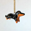 adorable dachshund porcelain pendant with gold, handmade