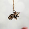 snow leopard pendant tail