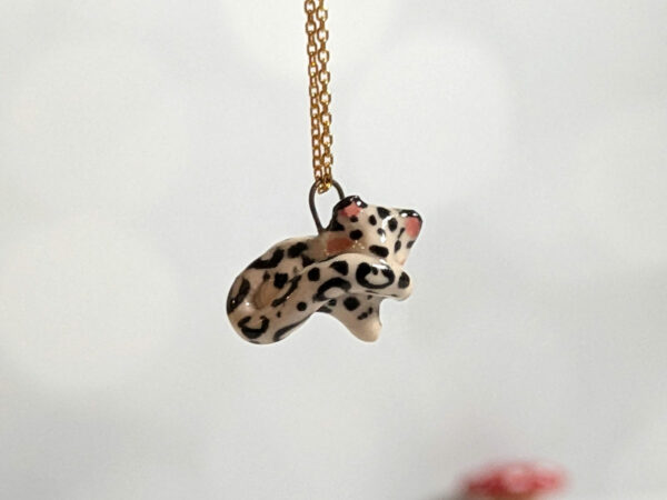 snow leopard pendant tail