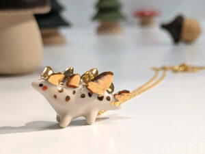 stegosaurus pendant cute porcelain jewelry by kness