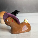 figurine capybara witch