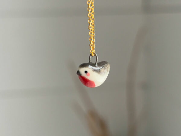 tiny bird pendant