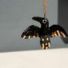 porcelain raven pendant