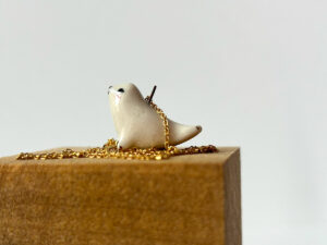 baby seal pendant in white porcelain