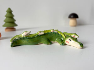 adorable figurine of a crocodile family