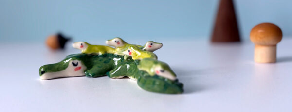 cute porcelain crocodile mama figurine and babies