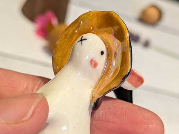 adorable porcelain figurine of a witch bunny