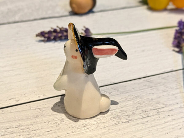 adorable porcelain figurine of a witch bunny