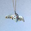 cute handmade porcelain barn owl pendant with wings out and gold