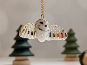 cute handmade porcelain barn owl pendant with wings out and gold