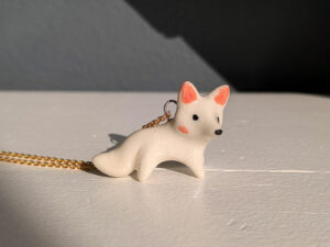 white fox pendant