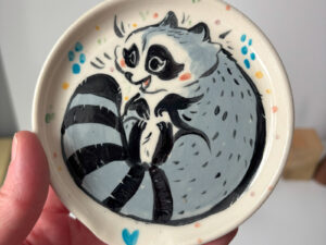 cute handmade raccoon spoon rest Canadian Pottery by Kness