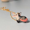 screaming opossum pendant