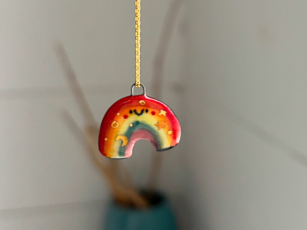 adorable rainbow porcelain pendant by kness