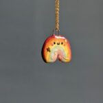 adorable rainbow porcelain pendant by kness