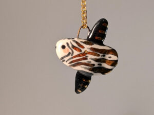 slender sunfish pendant with gold