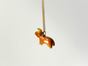 handmade porcelain pendant capybara orange