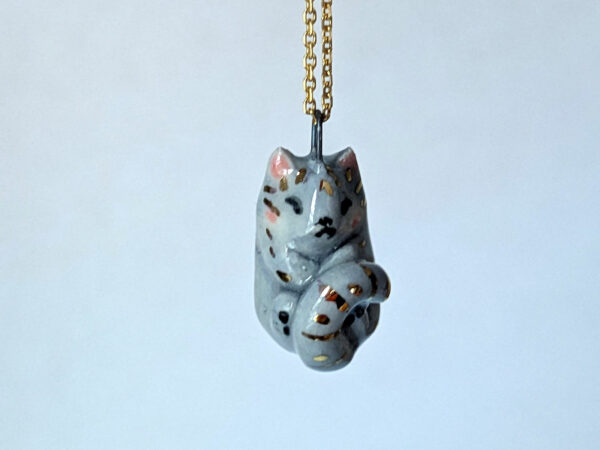 Adorable sleepy cat porcelain pendant