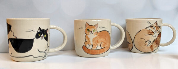 three cat portrait mugs