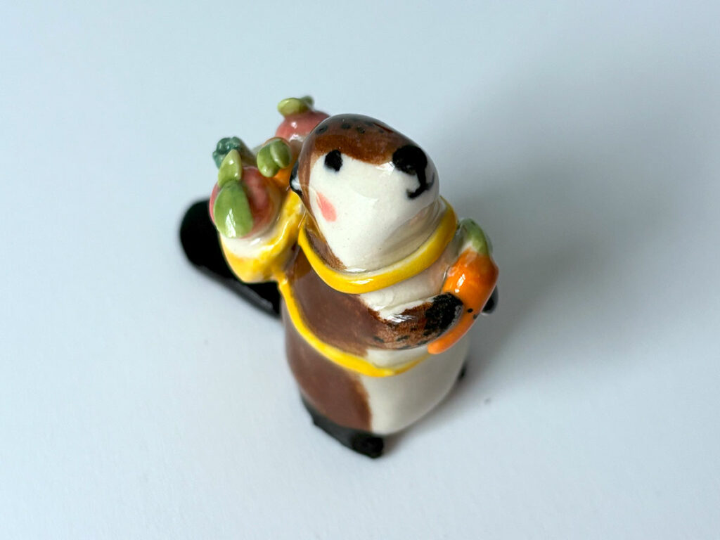 cute beaver holding vegetables figurine porcelain kness