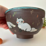 bowl black clay blue foxes