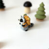 adorable raccoon figurine with a cute backpack porcelain