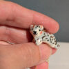 tiny snow leopard pendant