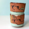 red stoneware capybara cup