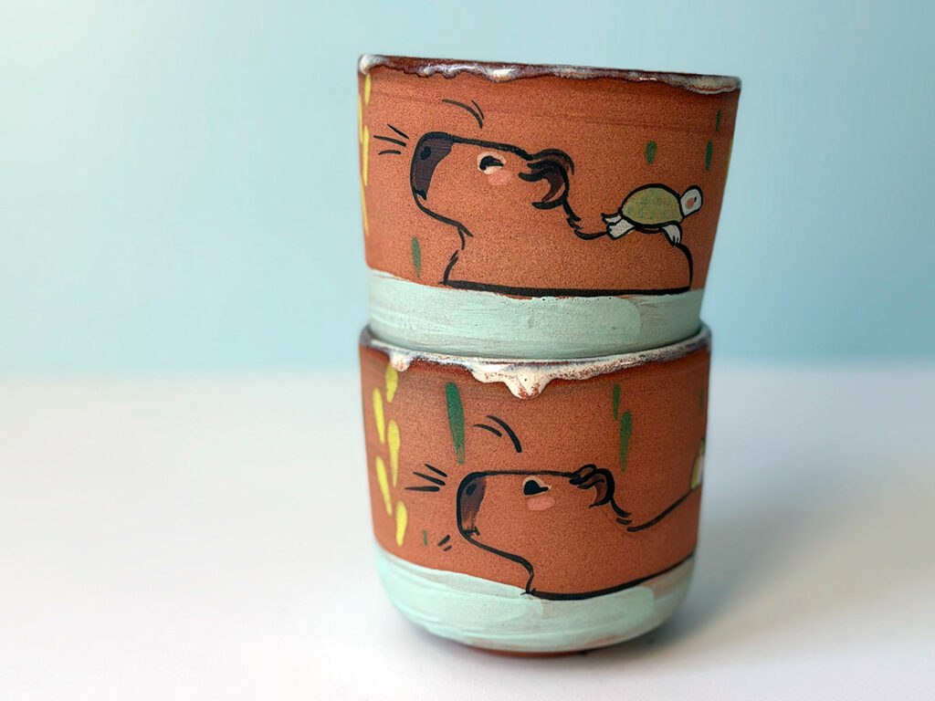 red stoneware capybara cup