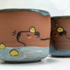 red stoneware capybara cup