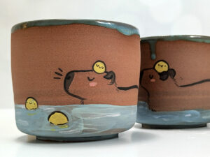 red stoneware capybara cup