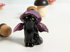 black cat witch porcelain figurine