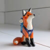 red fox hiker figurine