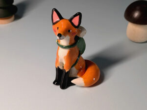 red fox hiker figurine