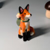 red fox hiker figurine