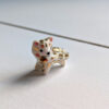 tail in mouth snow leopard pendant with gold