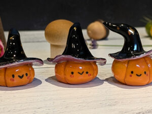 pumpkin witch figurine