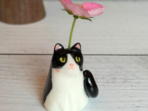 whiskers vase tuxedo cat