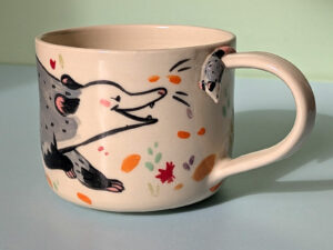 Adorable opossum sculpted mug handmade with porcelain