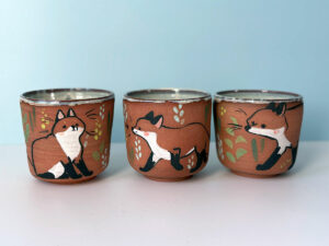 original artwork handmade ceramic cups with foxes each piece is one of a kind unique gift made by kness in Québec Canada