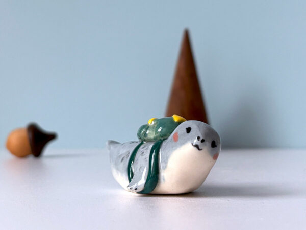 cutest seal figurine with a backpack, handmade porcelain collectible piece