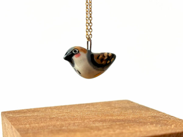 very cute handmade sparrow pendant in porcelain and gold