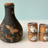 pretty ceramic sake set with 4 shots and decorated with owls