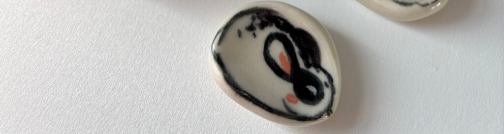 Ceramic Worry Stone with a little bunny one one side 